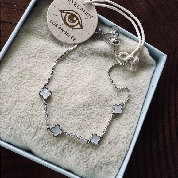 Eye Candy Silver Bracelet with White Floral Charms - Picture 2 of 4